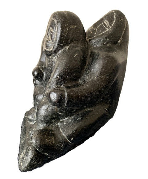 Femme en traineau avec son enfant